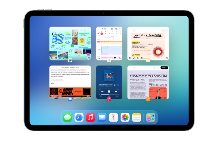 Un iPad, posición horizontal, la pantalla muestra varias apps como Calendario y Música acomodadas en un mosaico de seis ventanas dispuestas en dos filas de igual tamaño
