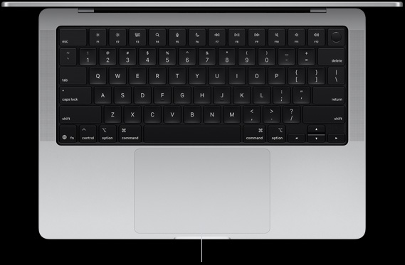 Pohled shora na otevřený 14palcový MacBook Pro ukazuje Force Touch trackpad umístěný pod klávesnicí