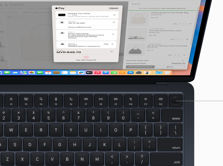 MacBook Air showing user authorising payment for online shopping purchase using Touch ID