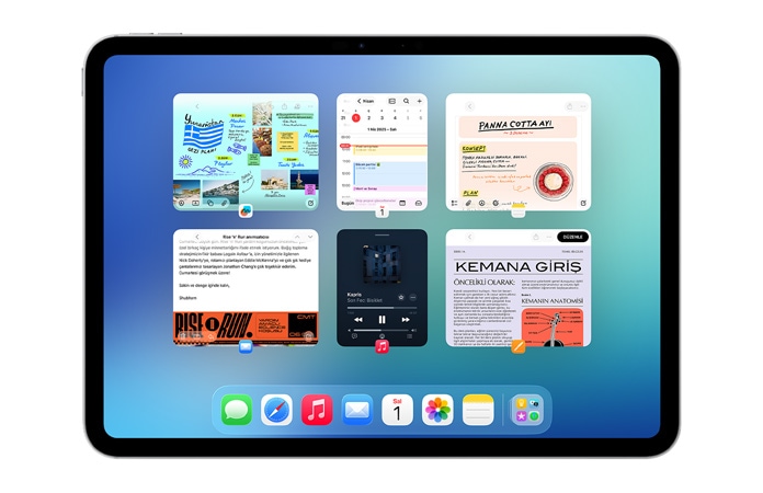 iPad, yatay pozisyonda, ekranda Takvim uygulaması, Notlar uygulaması, Apple Music ve Safari dahil olmak üzere iki sıra halinde açık altı pencere gösteriliyor