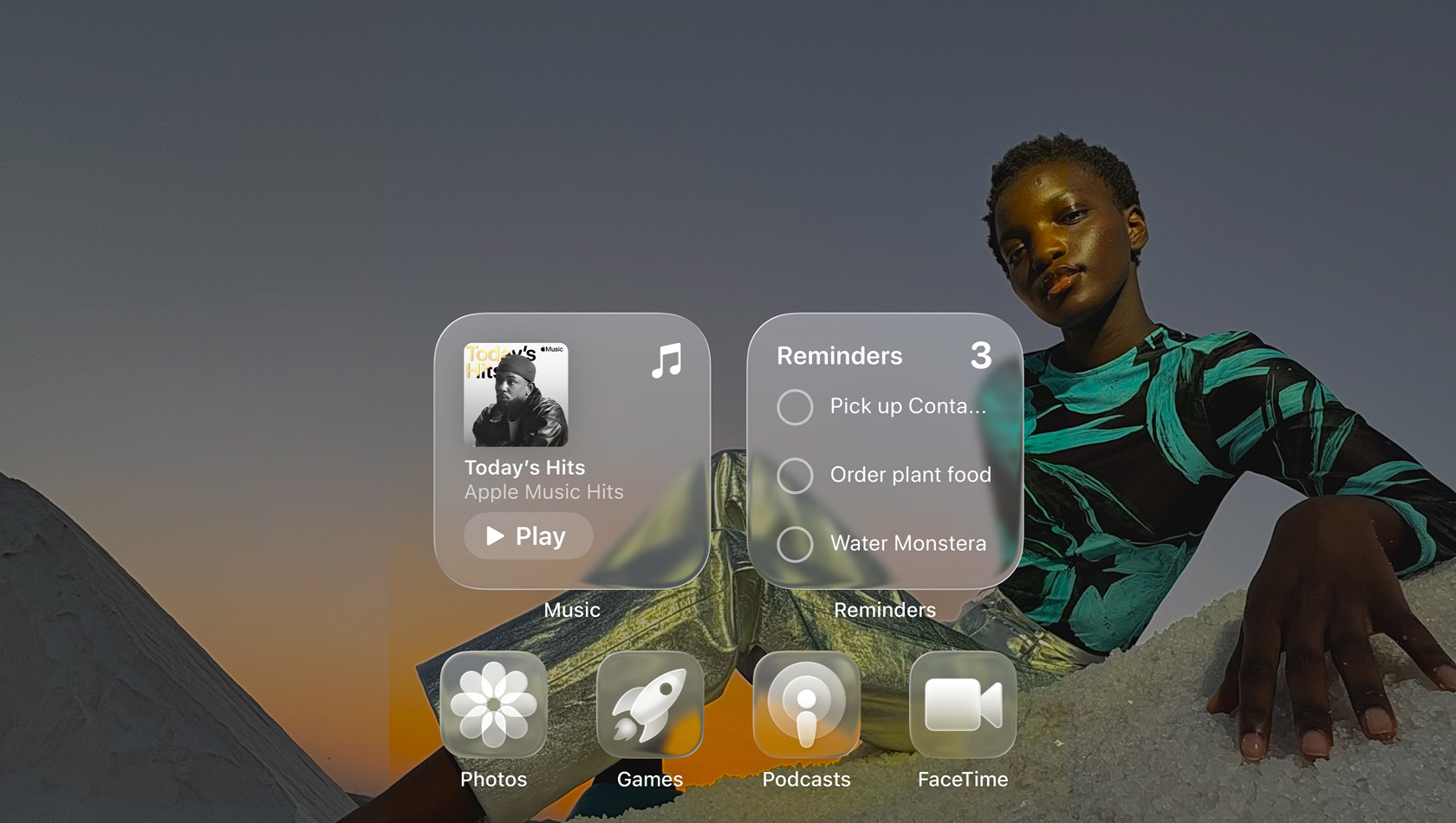 Liquid Glass display with clear app icons, like Apple Music, Reminders, Photos, Games, Podcasts and FaceTime refracting against the wallpaper